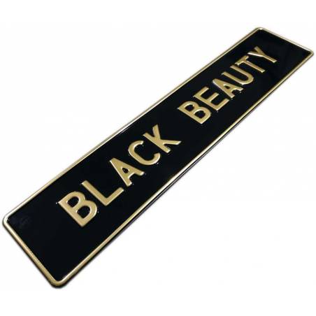 Czarna tablica rejestracyjna, złoty napis BLACK BEAUTY