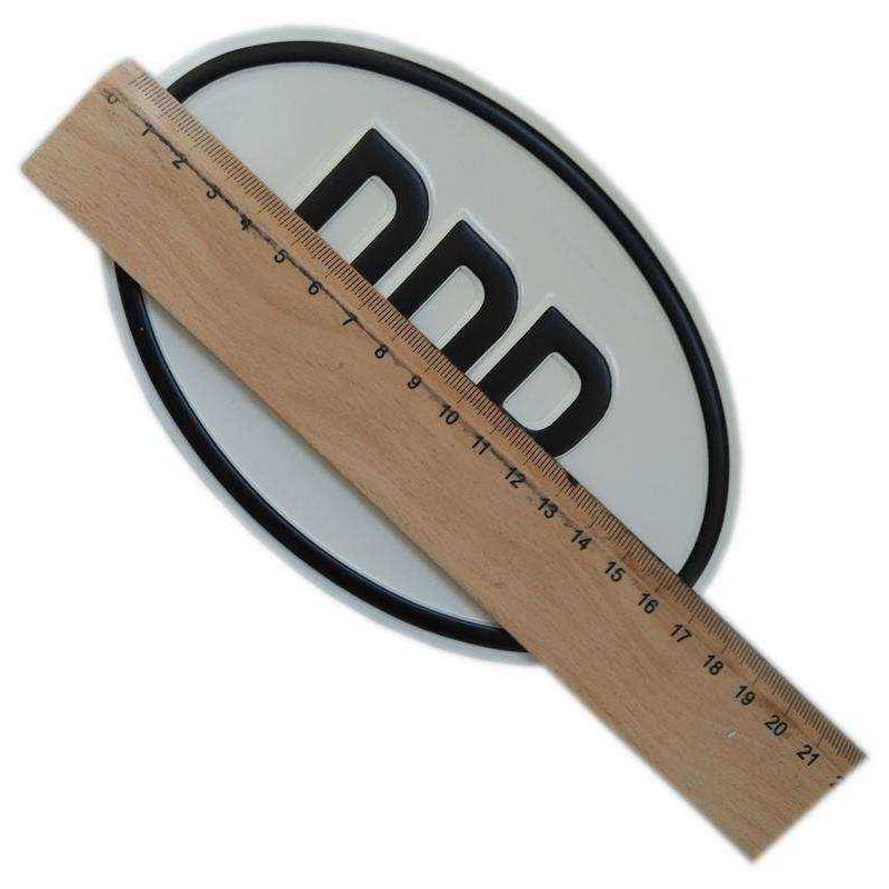 owalna tabliczka, elipsa, białe tło, czarny napis DDR